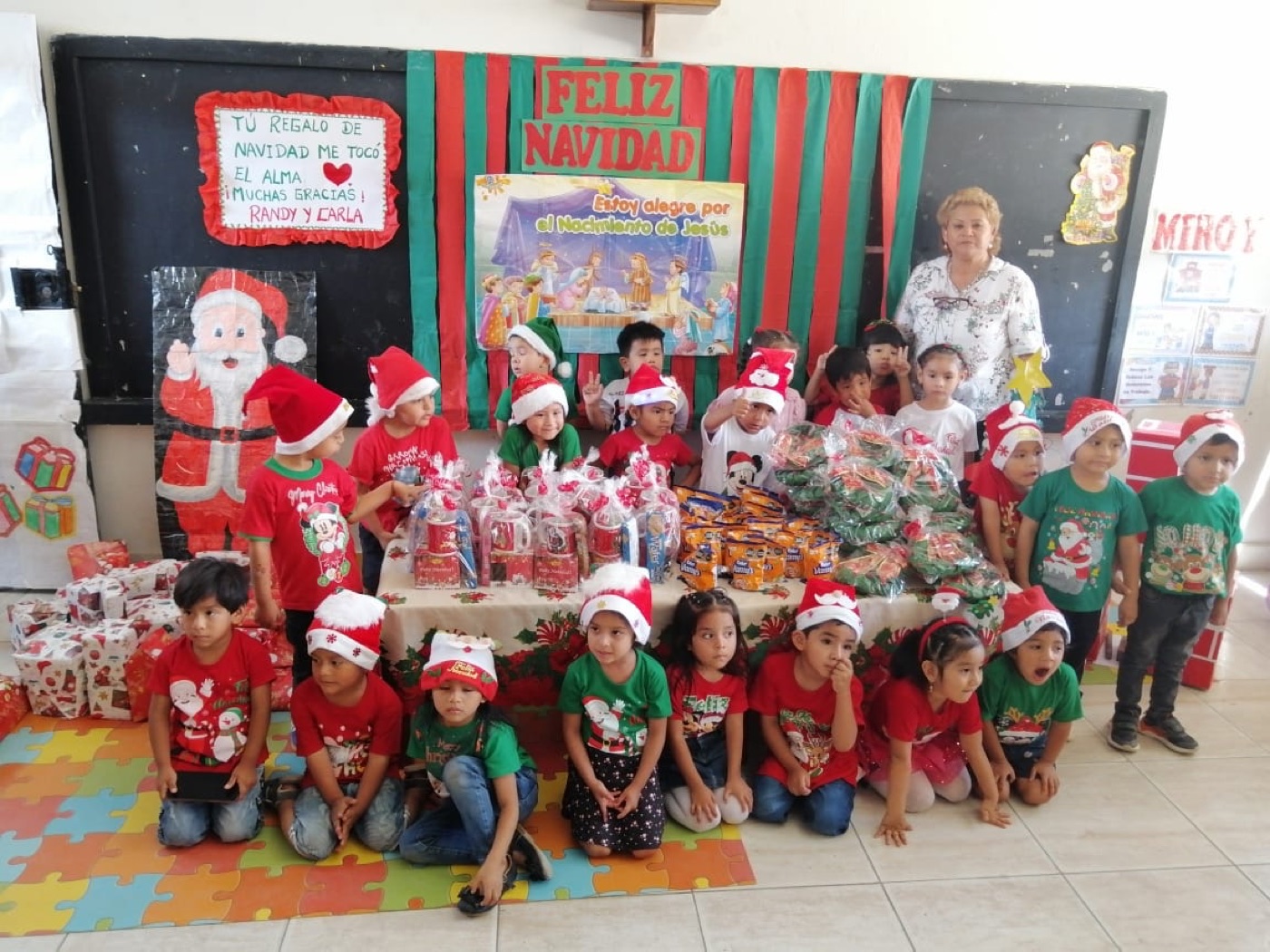 Children and teachers gathered for a Christmas celebration