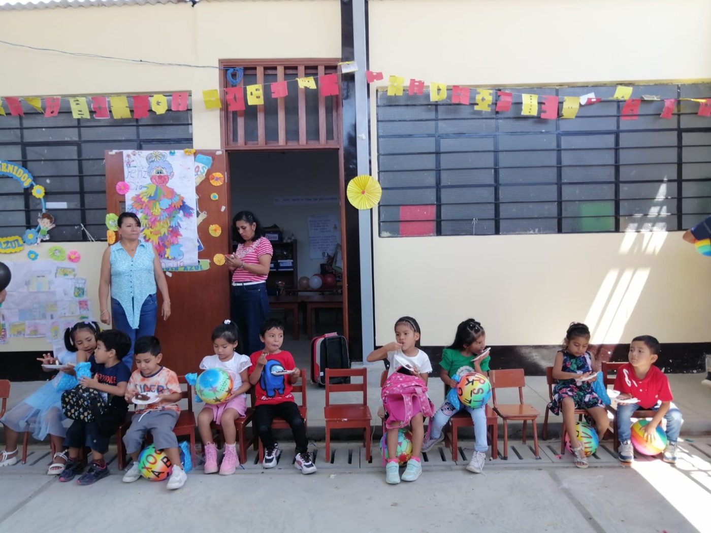 Children gathered outdoors during a community outreach event
